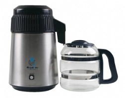 Zeige Details für Dampf - Destilliergerät mit Glaskanne Bild von Dampf - Destilliergerät mit Glaskanne